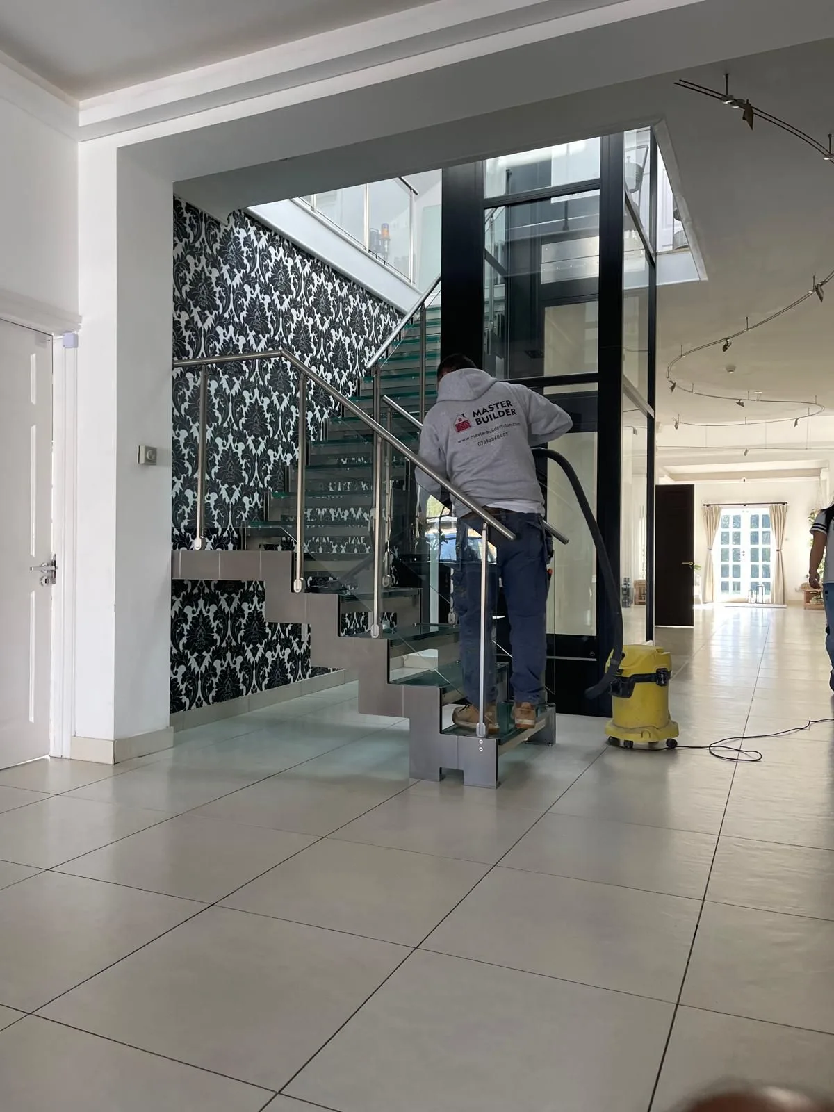 Modern interior with glass staircase